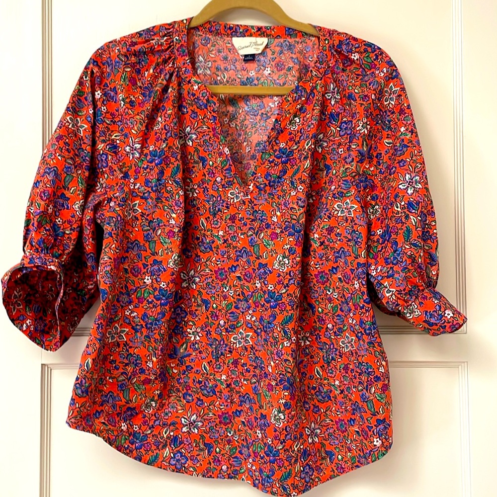 Brightly colored floral blouse